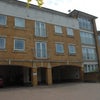 Photo 1: Courtyard view of flat