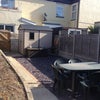 Photo 7: Sunny rear garden with seating, bike storage and rear access