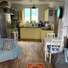 Photo 2: Lounge and kitchen looking towards back of house 