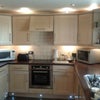Photo 4: Kitchen has built in washer and built in seperate dryer built in f/freezer all appliances