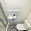 Photo 17: Downstairs bathroom with shower
