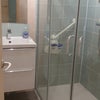 Photo 6: bathroom with shower, washbasin and toilet