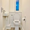 Photo 5: Upstairs Cloakroom