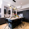 Photo 2: Large Kitchen & Island. 3 x Fridges, 2 x Ovens, 2 x Dishwashers, 2 x Sinks