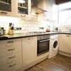 Photo 4: The kitchen