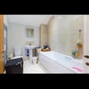 Photo 4: Shared bathroom area.