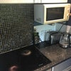 Photo 4: Kitchchen with stove oven and microwave