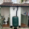 Photo 8: Outside toilet/washing machine