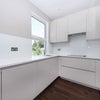 Photo 6: fully equipped kitchen - wide angle lens