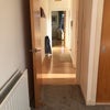 Photo 6: Hallway which also has large storage cupboard 
