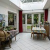 Photo 4: The dining room gets lots of light thanks to the glass roof
