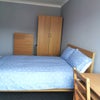 Photo 2: Rm 1, beautifully decorated, with new bed and bedding provided for your convenience, new sofa, desk 