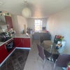 Photo 4: Kitchen cum Living room