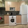 Photo 4: Fully equipped kitchen with oven, grill & hob, 8kg washing machine, iron, board & more.. 