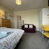 Photo 1: Spacious, light & bright double bedroom with sofa, 2 double wardrobes, chest of draws, table & chair