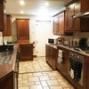Photo 5: Kitchen with all the works still!