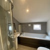 Photo 3: 1 of 2 bathrooms between 6