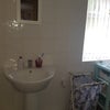 Photo 7: Downstairs Bathroom with Tub & Shower
