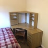 Photo 6: Computer desk, chair, shelving and drawer storage.