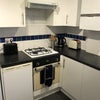 Photo 4: Kitchen has gas hob, electric oven, kettle and toaster all provided.