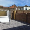 Photo 9: Sunny rear garden with bike storage, rear access and now with seating!