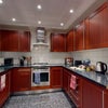 Photo 6: Large open kitchen with plenty of storage