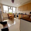 Photo 2: SUNNY FULLY EQUIPPED KITCHEN WITH 2 FRIDGES/FREEZERS 