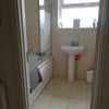 Photo 5: Bathroom, shower over bath, basin, toilet