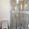 Photo 3: Common Bathroom Shower