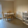 Photo 8: Dining area with sofa (behind camera!) 