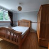 Photo 8: Double bedroom with solid oak king size bed and memory foam mattress fully furnished. 