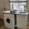 Photo 5: Kitchen, with washing machine and single oven
