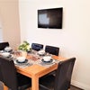 Photo 6: Dining Area with TV