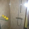 Photo 7: Modern bathroom with towel radiator, shaver points, splashwall (tile-free) shower panels