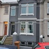 Photo 8: House Front