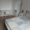 Photo 2: Bedroom for rent. Double bed with a memory foam mattress, blackout thermal curtains, a wardrobe that