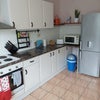 Photo 7: Large kitchen space with all your necessary appliances: fridge-freezer, oven, hob, washing machine, 