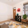 Photo 3: Front room of shared house