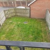 Photo 8: Shared Garden with garage behind