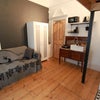 Photo 3: Open plan living with double sofabed & wardrobe