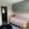 Photo 2: Fitted cabinets & Bed