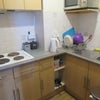 Photo 6: Upstairs kitchen