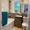 Photo 6: Bathroom upstairs, with shower over the bath