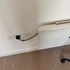 Photo 5: Electric heating behind bed