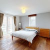 Photo 1: Master bedroom with built-in closet