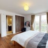 Photo 2: Master bedroom with built-in closet