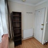 Photo 3: Bookshelf storage