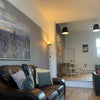 Photo 2: Communal Lounge Dining Kitchen