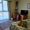 Photo 4: Desk, TV, hairdryer