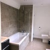Photo 3: Large bathroom with shower over bath, toiler and full size sink.  Storage and airing cupboard.